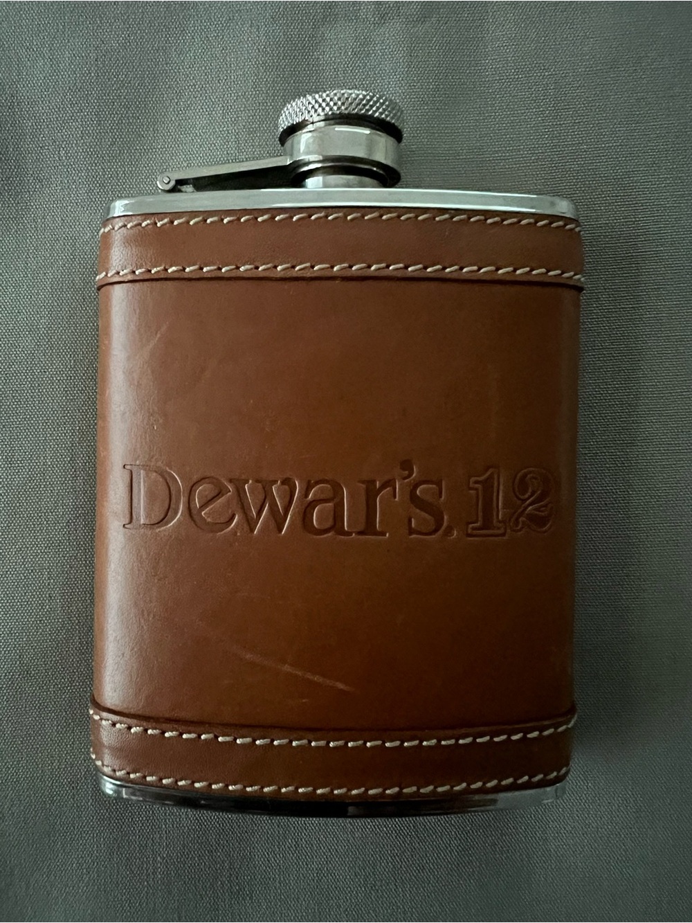 Dewar’s Leather Wrapped Stainless Steel Flask.